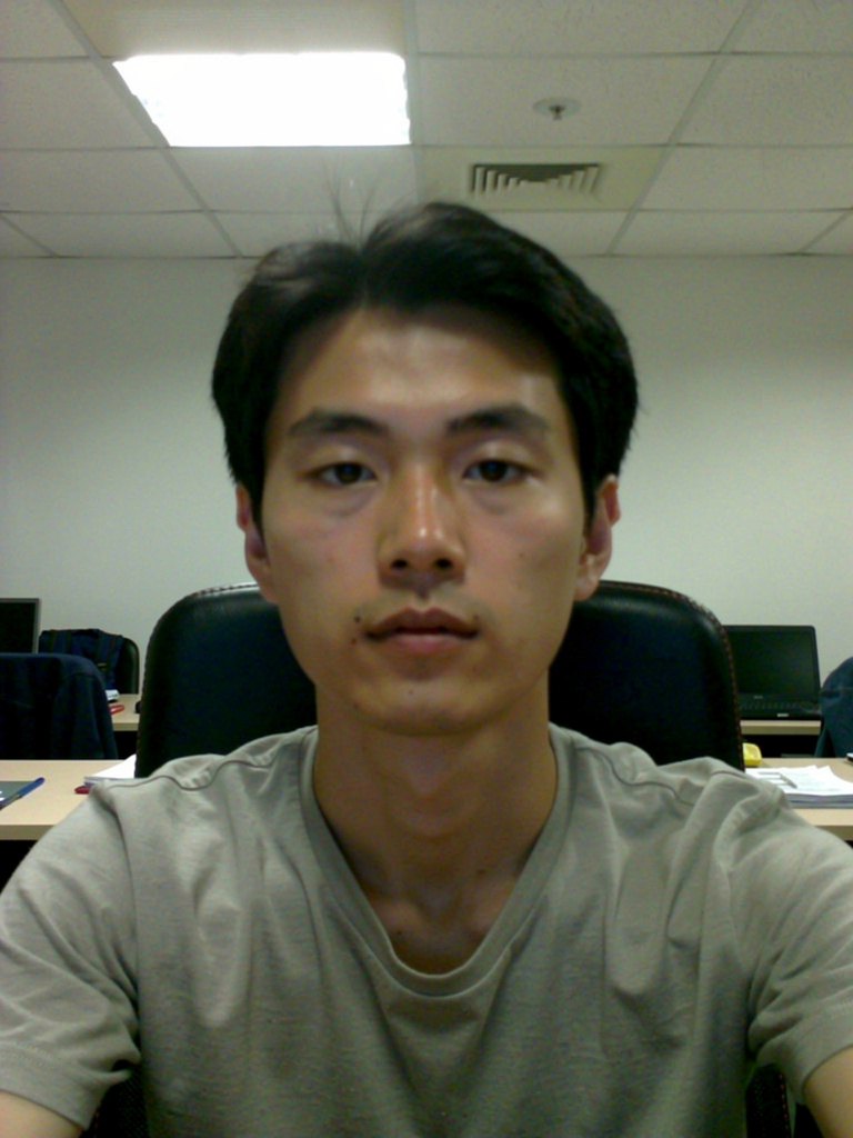 Casual before photo &mdash; an everyday snapshot of an East Asian man in his late 20s (AI-generated)