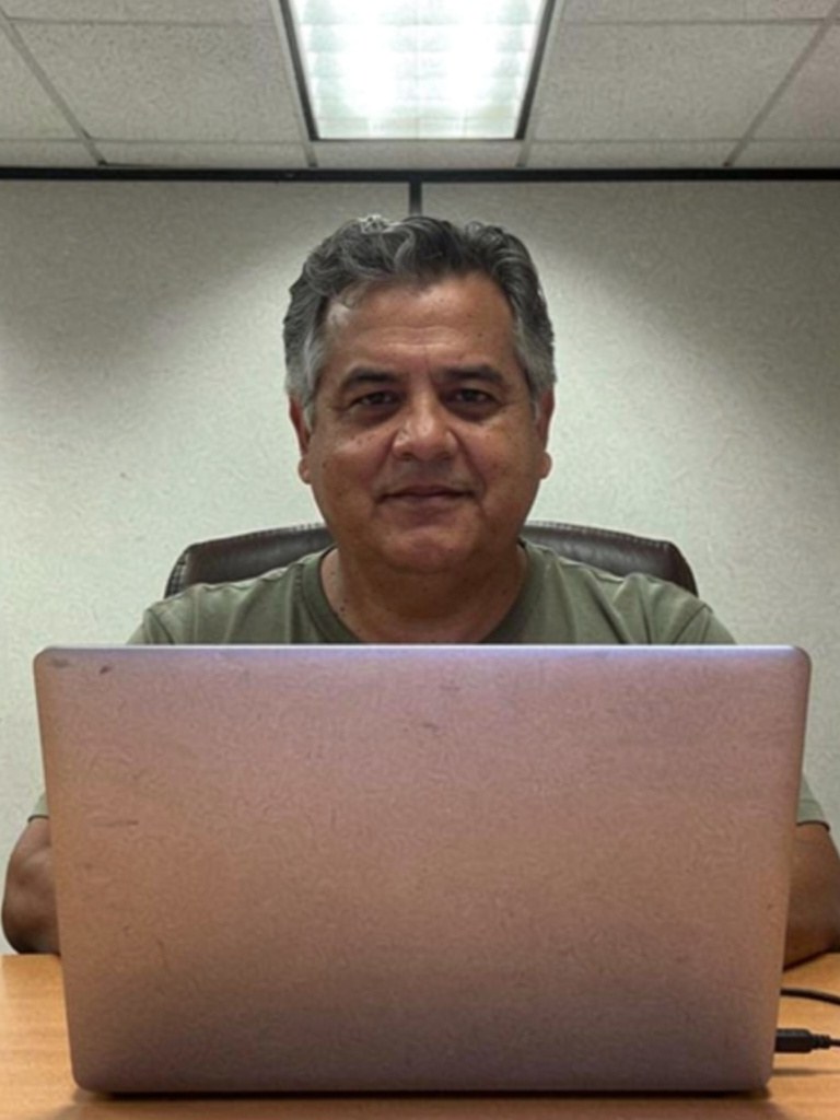 Casual before photo &mdash; an everyday snapshot of a Latino man in his early 60s (AI-generated)